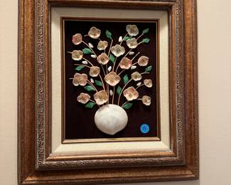 M41 - $15 shell/stone wall art. Measures 14.5" x 17". 