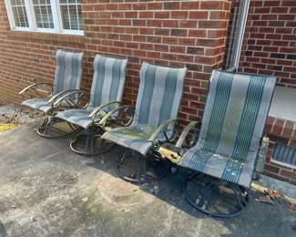 M86 - $40 set of 4 chairs that rock - just need a pressure wash!