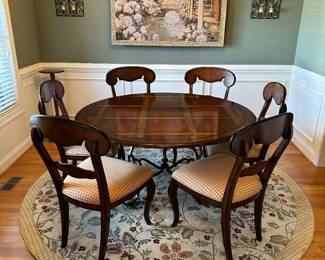 M1 - $400. Chairs are Hooker furniture. Table is unmarked. Metal base & Wooden Top. Upholstery is in great shape! Table is 5' round. 