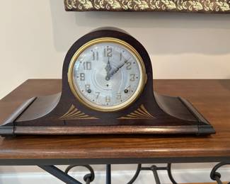 M11 - $50. Plymouth Mantle Clock. Measures 20" long. Has key.  Very pretty inlay / case. 