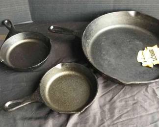 Three Lodge Cast Iron Skillets
