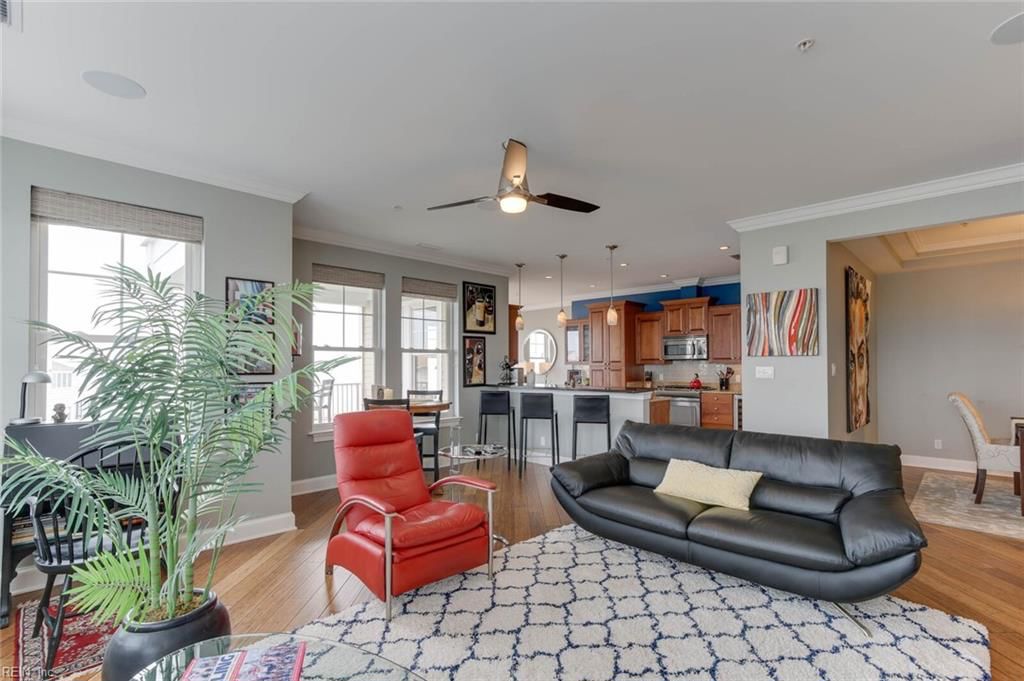 ONLY available in this photo: Italian Natuzzi leather couch and Nourison rug