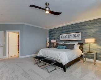 ONLY available in the photo: Ethan Allen king size bedframe + mattress, 2 Ethan Allen glass side tables, 2 Ethan Allen ottomans. 