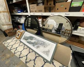 ONLY AVAILABLE in this photo: Ethan Allen black round mirror, Ethan Allen stainless steel round mirror, Nourison rug, framed art