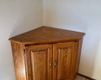 Corner cabinet with deep two level storage