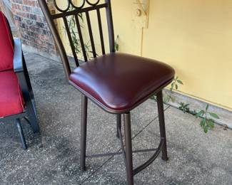 set of three burgundy leather heavy metal barstools with back. 