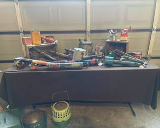 More than a dozen antique agricultural sprayers that date back to the early 1900's. Some have beautiful glass bases.