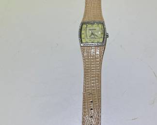 Mother of Pearl and rhinestone rimmed ladies watch with pink leather alligator-grain band