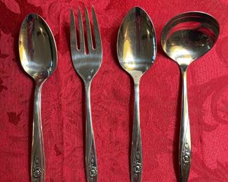 Set of 50 Oneida craft deluxe stainless silverware in Lasting Rose pattern. 