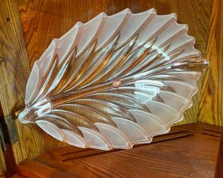 Elegant crystal platter with etched wave-style edge and palm-inspired interior design