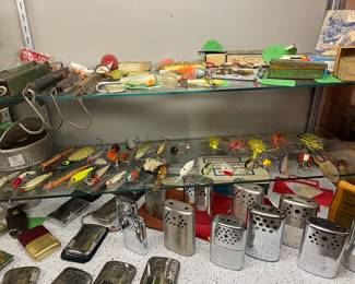 Vintage fishing lures and pocket warmers 