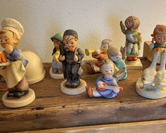 Dozens of Hummel figurines, including Christmas Hummels 