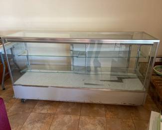 Fantastic lighted display cabinet with two adjustable shelves.