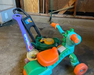 Childrens toys - lawnmower, popcorn push toy and tricycle
