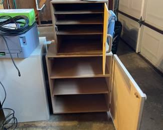 Both storage cabinets with open doors 