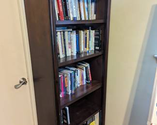book case and books are for sale