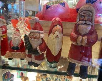 Hand carved wooden Santa's 