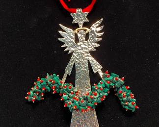 Los Castillos sterling angel with malachite and coral garland.