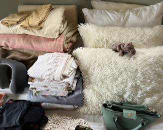 Linens; throw pillows.