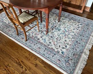 Vintage 100% wool rug hand-knotted in India, 9’ x 5’11”.