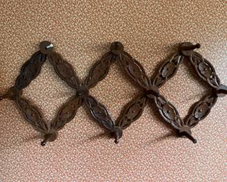 Interesting carved wood wall rack.