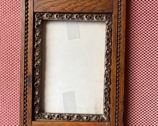 Ornate antique wood picture frame.