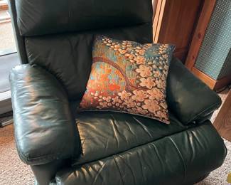 Recliner, dark green, leather or leather-like.