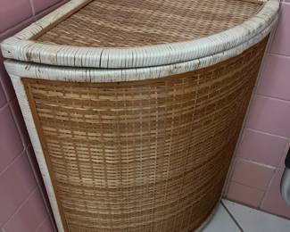 Woven/wicker corner hamper.