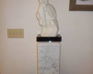 Sculpture and marble pedestal