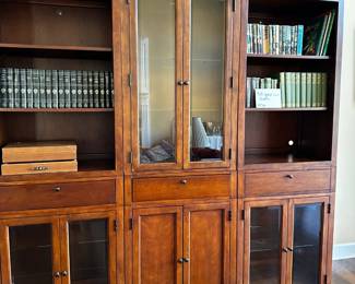 Bassett.  Comes in six pieces.  Glass shelves can be substituted for wood ones.