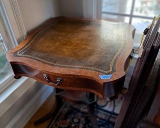 Mahogany table with tooled leather top