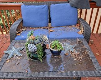 Outdoor coffee table and loveseat
