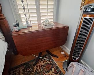 Drop leaf mahogany table; lamp; rug