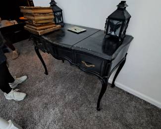 French style vanity. Middle section opens to reveal mirror and storage