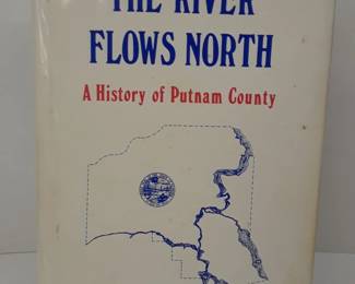 Scarce autographed copy of the River Flows North 