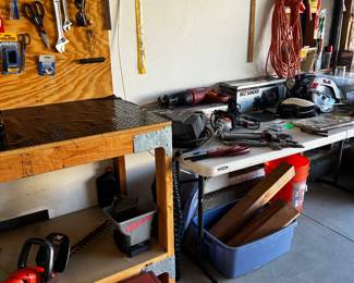 Wooden tool bench and red metal tool box