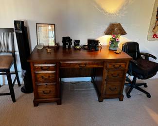 Winners Only USA INC wooden office desk, Bushnell binoculars, office chair