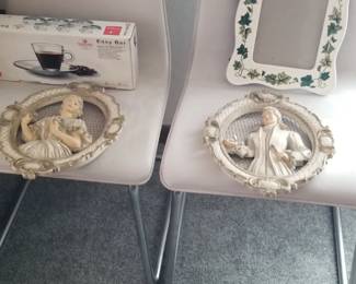 Suede designer chairs.
Chalkware 1950s Victorian couple.
