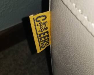 Recliner leather couch made by Cheers company. 