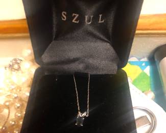 One of several pieces of gold & silver jewelry