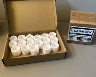Battery operated votives, and a box of nine pack, beeswax candles