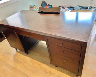 $650 - Magnussen desk with outlet in desk - 31.5" H, 66" W, 30" D 