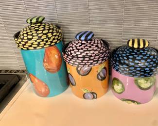 $75 - Set of 3 Droll Designs colorful fruit canisters - left: 9.5" H, 5.5" diam
