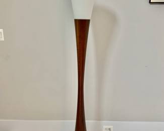 $250 - Hourglass floor lamp - 68" H, 10"D - Turn the lamp on and off with a conveniently located foot step switch. This lamp has a clear cord and is smart outlet compatible.