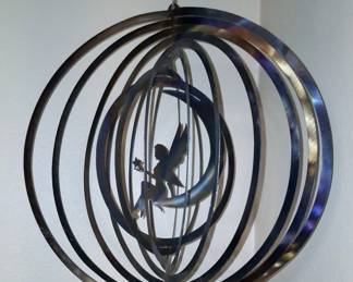 Hand-carved, metal art