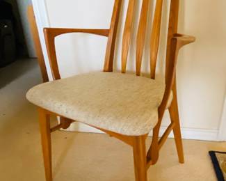 set of four teak dining chairs