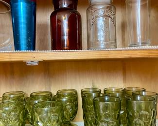 vintage avocado green glassware, aluminum cups, Mr. Peanut canister, amber jar with lid