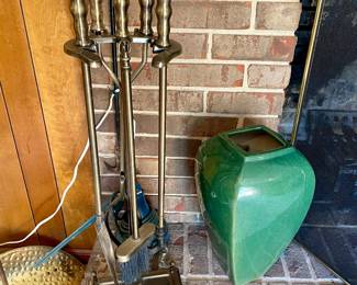 brass fireplace tool set, green ceramic vase, brass log holder