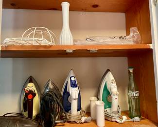 irons, coke bottle with sprinkler lid