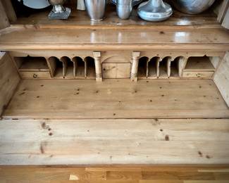 Wood breakfront with hidden pull-out desk